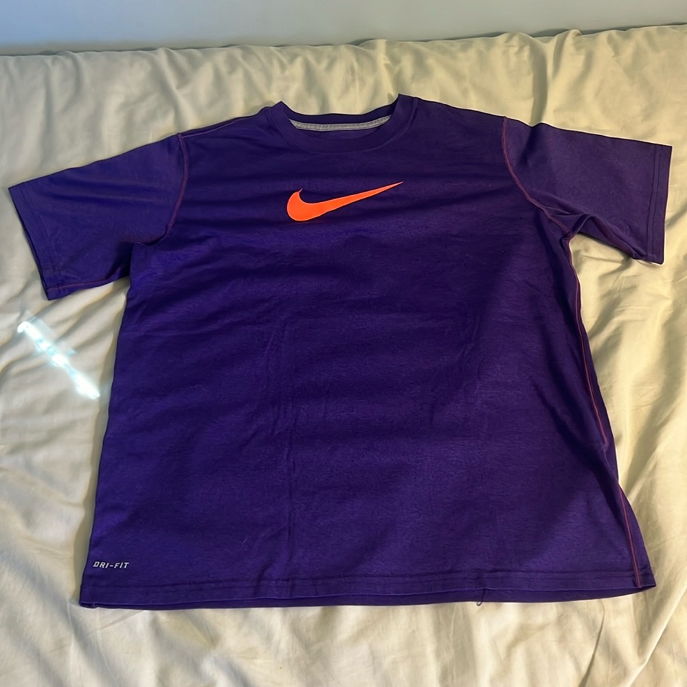 Purple Nike DRI-FIT shirt